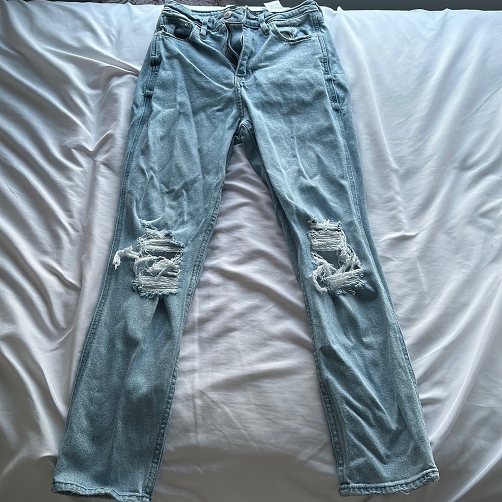 light blue ripped jeans